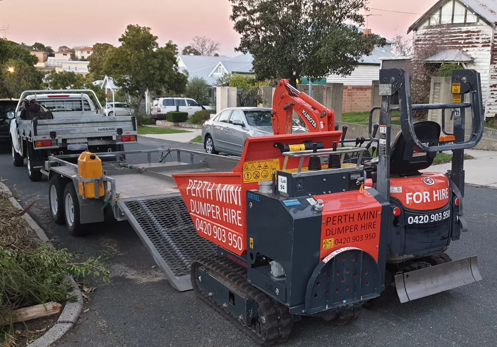digger-dumper-sunset mini digger and dumper on a trailer