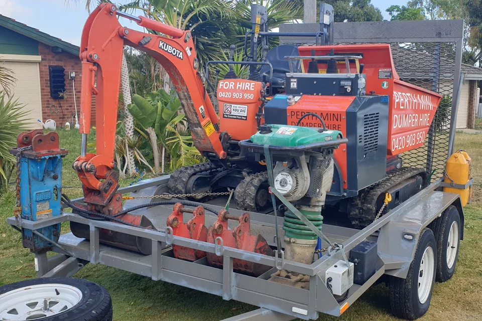 trailer-digger-dumper-breaker Trailer loaded with mini excavator and mini dumper